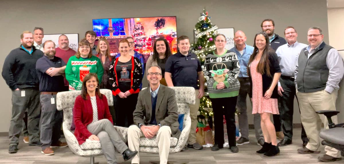 group photo from company holiday party 2021